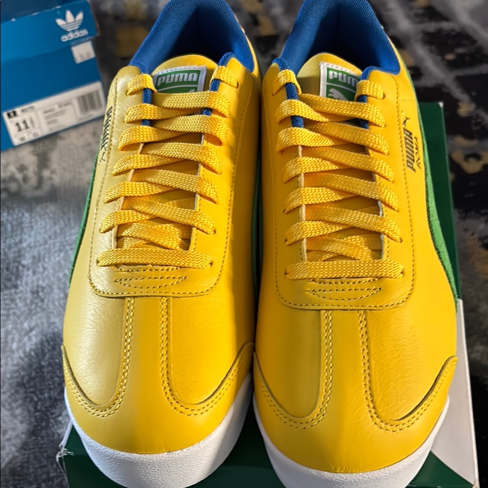 Brand New men’s Puma Romas size 11.5